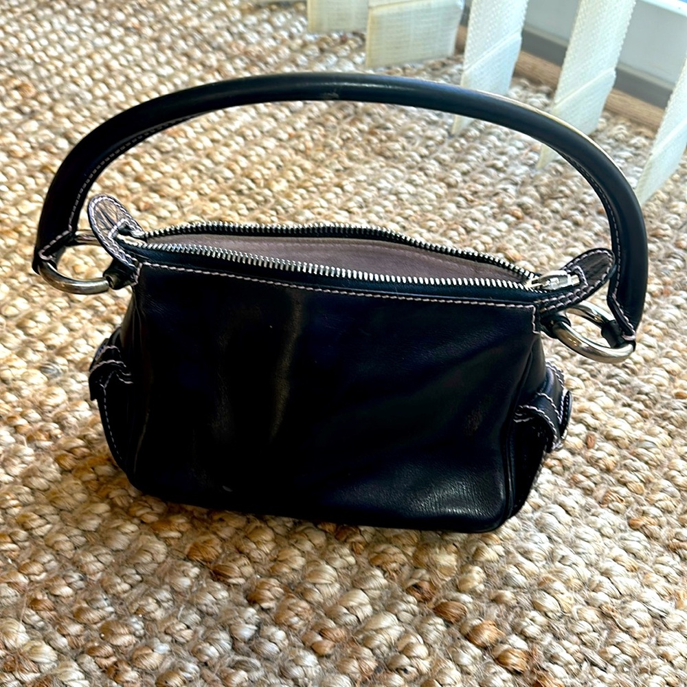 Marc Jacob’s cut leather bag! Doesn’t look used at all but no tags .